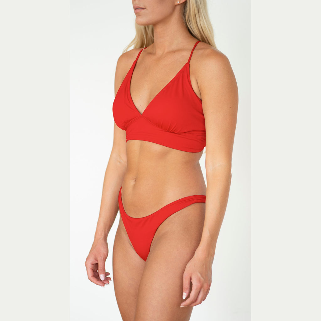 Red bikini set on a white background